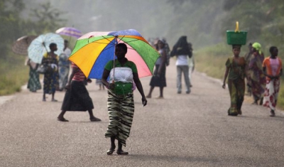 Democratic Republic of the Congo, Walikale, people walk on a street during th 2011 presidential elections.