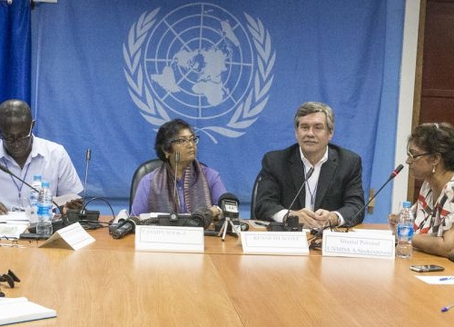 Two Commissioners of a three-member team from the UN Commission on Human Rights speak to Journalists at a press conference.