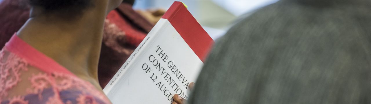 Student of the Executive Master in International Law in Armed Conflict with the book the Geneva Conventions