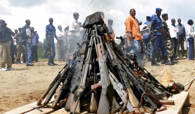 Weapons being burnt during the official launch of the Disarmament, Demobilization, Rehabilitation and Reintegration (DDRR) process in Muramvya, Burundi. 