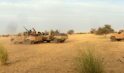 Armed Islamist fighters race near the Mauritania-Mali border
