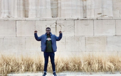 Jean-Paul Nizigiyimana in front of the Mur des Réformateurs in Geneva