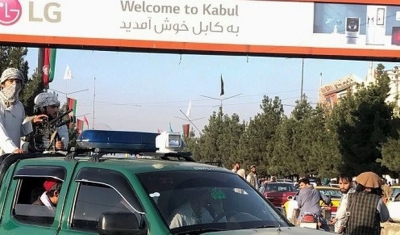 Taliban on a Toyota truck at the entrance of Kabul