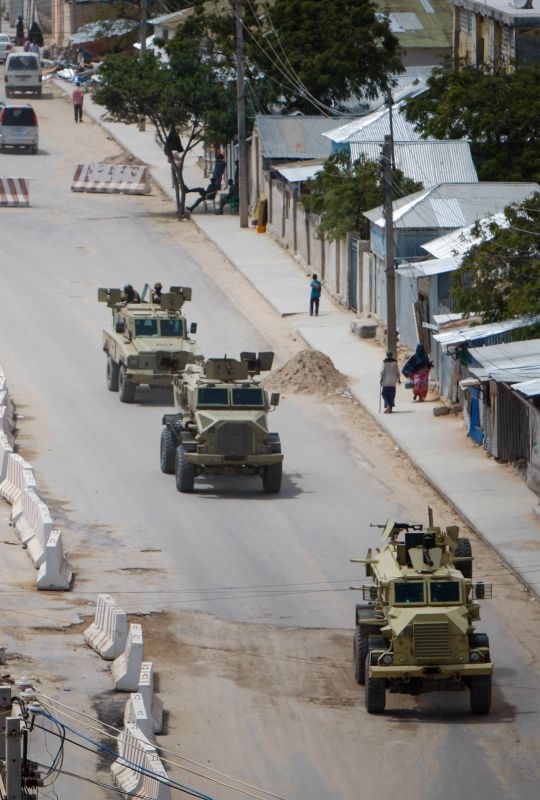 An African Union Mission in Somalia (AMISOM) convoy drives down the main road leading to Aden Abdulle International Airport in the Somali capital Mogadishu