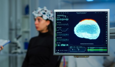 A person with a portable brain scanner