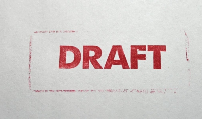 The word Draft written in red