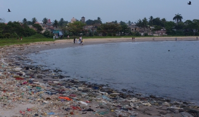 Polluted beach with plastic
